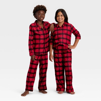  Kids' Plaid Long Sleeve Shirt And Pants Holiday Matching Family Pajama Set - Wondershop™ Red/Black
